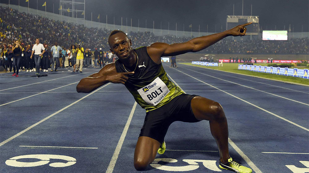 Bolt breezes to victory in 100 meters