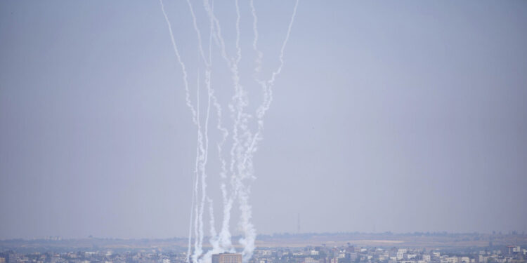 Rockets are launched from the Gaza Strip towards Israel, on Gaza City, Wednesday, May 10, 2023. Israeli aircraft struck targets in the Gaza Strip for a second straight day on Wednesday, killing at least one Palestinian and pushing the region closer toward a new round of heavy fighting. (AP Photo/Hatem Moussa)