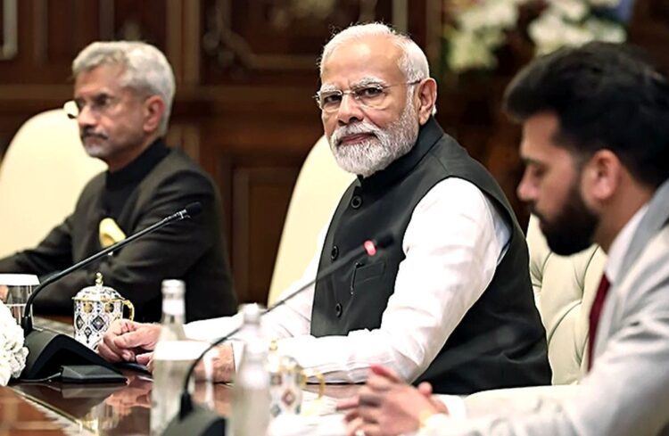 Samarkand, Sept 16 (ANI): Prime Minister Narendra Modi during a meeting with Uzbekistan President Shavkat Mirziyoyev (unseen) on the sidelines of the 22nd Meeting of the Council of Heads of State of the Shanghai Cooperation Organization (SCO), in Samarkand on Friday. External Affairs Minister S Jaishankar also seen. (ANI Photo)