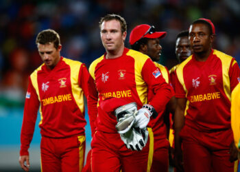 AUCKLAND, NEW ZEALAND - MARCH 14:  Brendan Taylor of Zimbabwe leads the team off the field at the end of the game during the 2015 ICC Cricket World Cup match between India and Zimbabwe at Eden Park on March 14, 2015 in Auckland, New Zealand.  (Photo by Phil Walter/Getty Images)