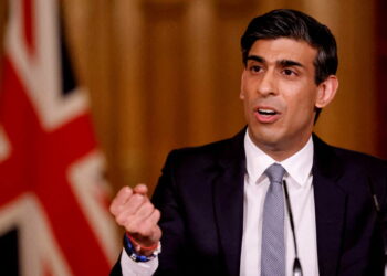 FILE PHOTO: Britain's Chancellor of the Exchequer Rishi Sunak attends a virtual press conference inside 10 Downing Street in central London, Britain March 3, 2021. Tolga Akmen/Pool via REUTERS
