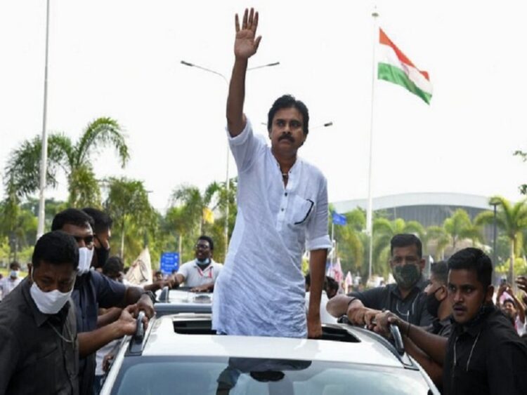 Visakhapatnam, Oct 31 (ANI): Jana Sena Party chief Pawan Kalyan waves to supporters as he takes out a rally from Visakhapatnam International Airport to Visakhapatnam Steel Plant in protest against privatization of the plant, in Visakhapatnam on Sunday. (ANI Photo)