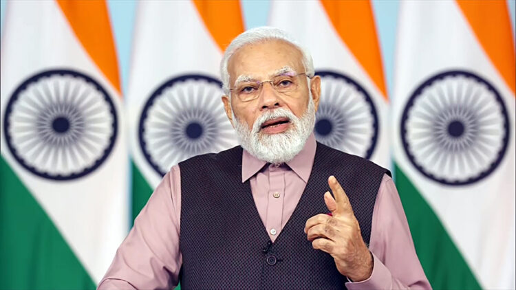 New Delhi, Aug 06 (ANI): Prime Minister Narendra Modi addresses during the foundation stone laying ceremony for the mega redevelopment project of 508 railway stations across the country under Amrit Bharat Station scheme, via video conferencing on Sunday. (ANI Photo)